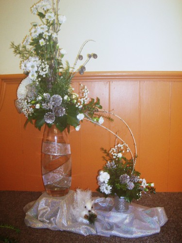 Tableau of Christmas Flower Arrangements